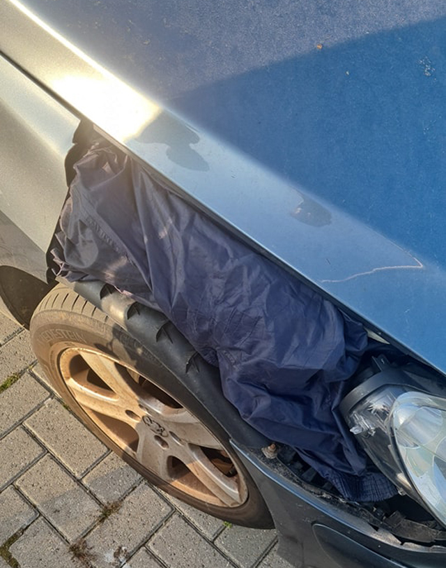 Bestuurder gebruikt regenbroek om schade op te vullen aan auto Taxandriaweg Waalwijk